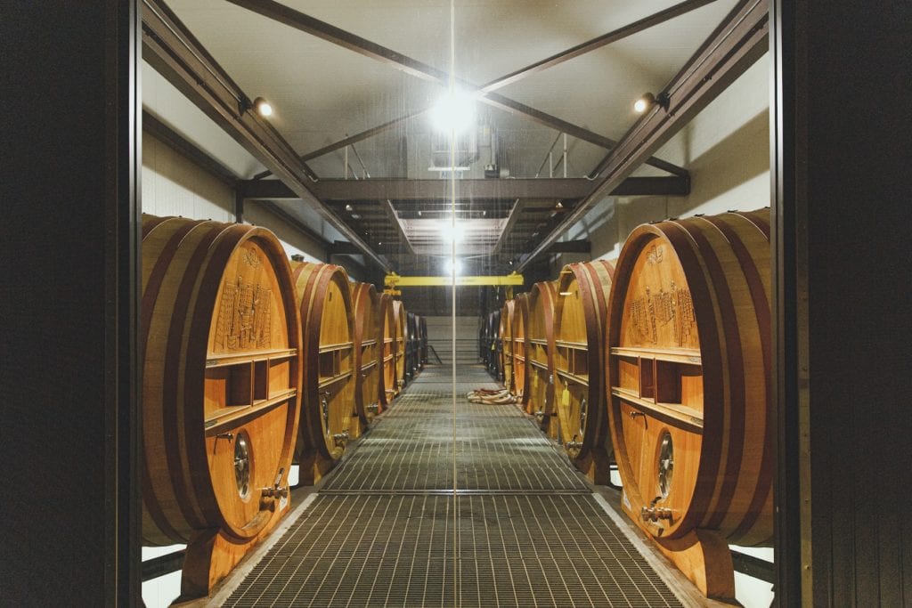 large carved wooden wine barrels in a room